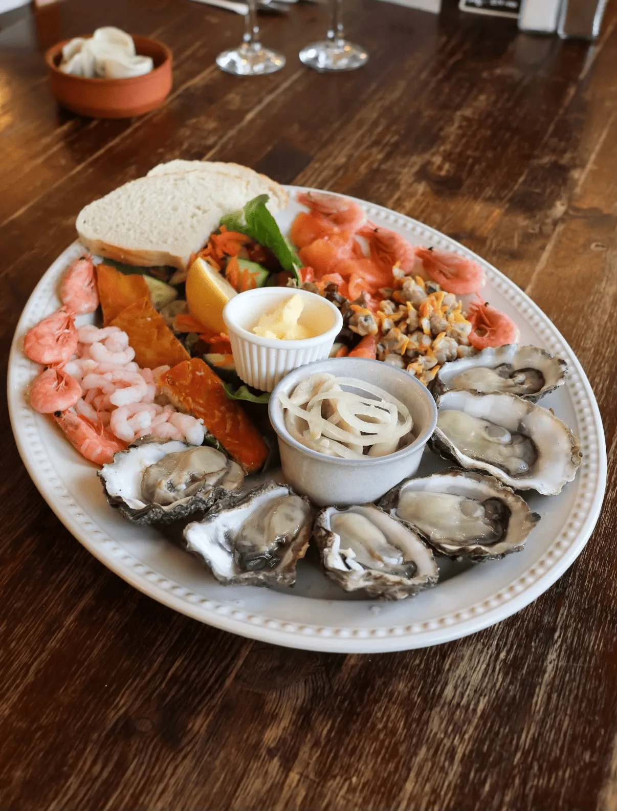 Cold seafood platter with oysters, prawns, cockles and smoked fish